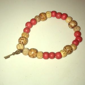 Wooden bead necklace with key